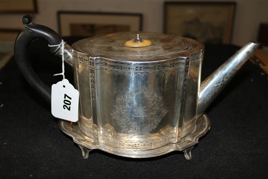 An early Victorian silver teapot and stand
